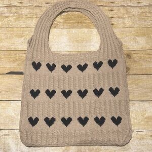 Stylish Tan Knit Tote Bag with Black Heart Accents